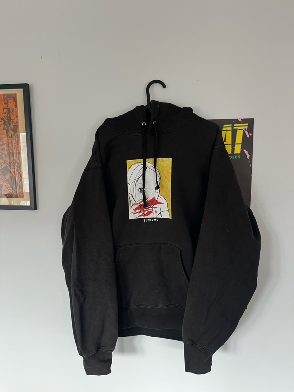 Supreme Black Hoodie with Yellow & Red Graphic